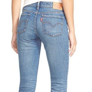 Levi’s 711 jeans, flower design on side